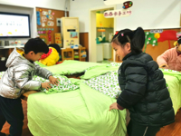 我是叠被小高手——记团结桥中班组幼儿“叠被子”活动